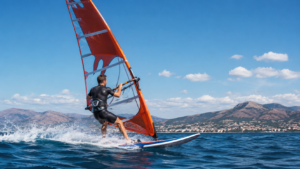 Realistyczna grafika przedstawia dynamiczną scenę sportu wodnego — windsurfingu na otwartym morzu